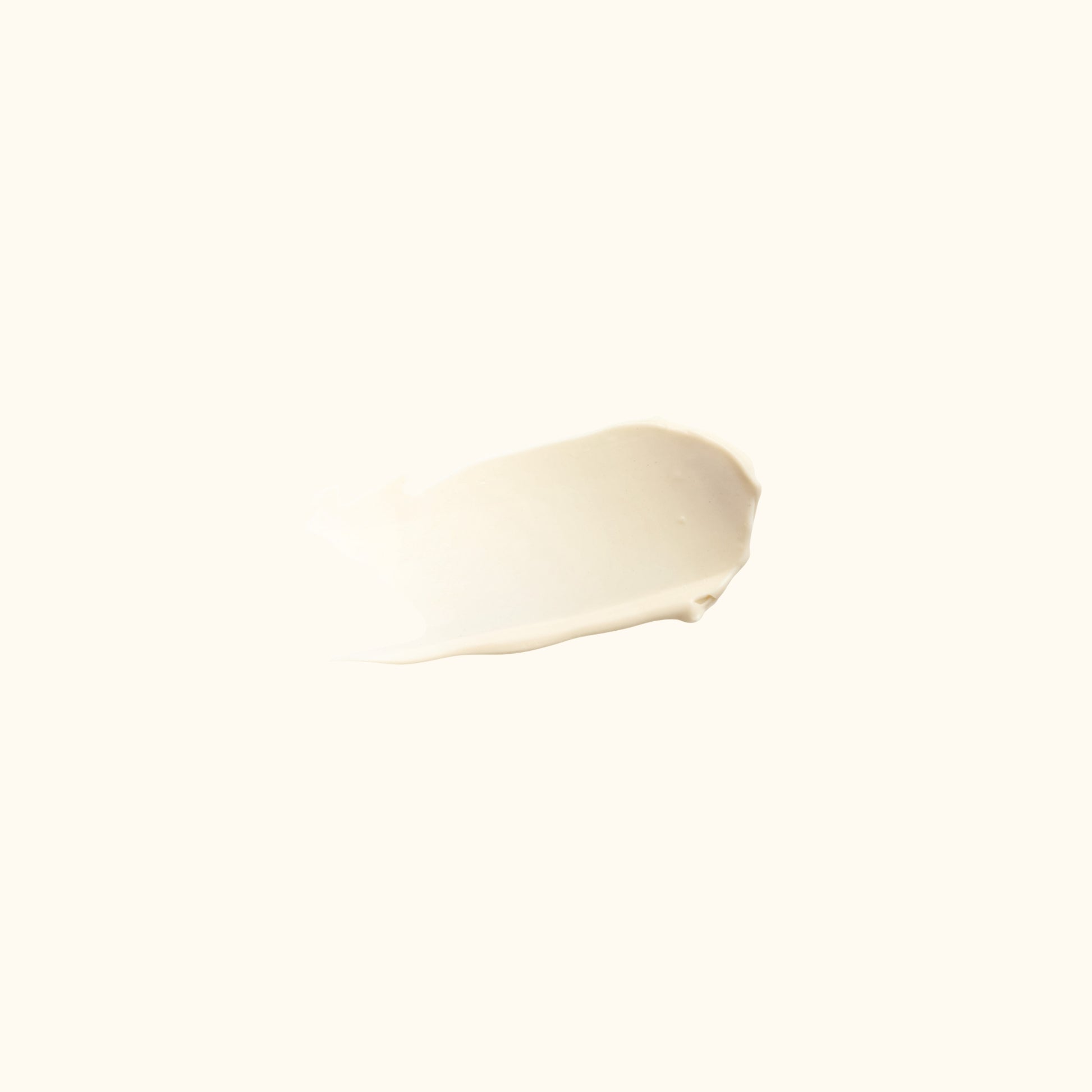 Close-up of Beacon Styling Cream swipe, lightweight hair cream with light shine and flexible hold, natural water-based styling product.