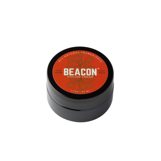 Beacon water based natural hair styling cream in jar orange label